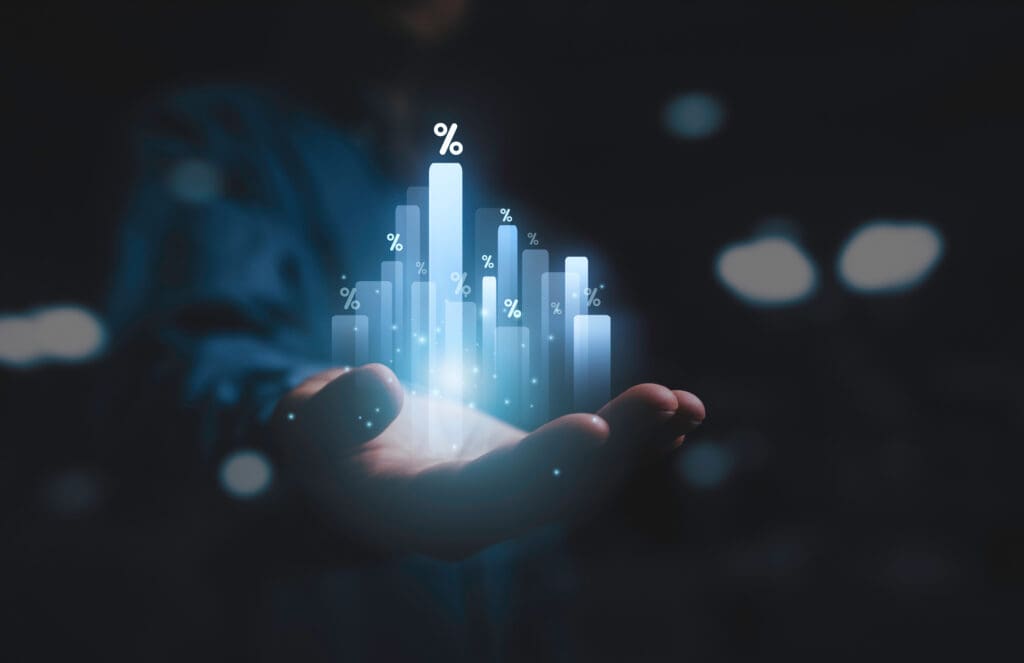 Businessman holding of bar graph with percentage financial banking increase interest rate or mortgage investment dividend from business growth concept. Businessman holding of bar graph with percentage financial banking increase interest rate or mortgage investment dividend from business growth concept.
